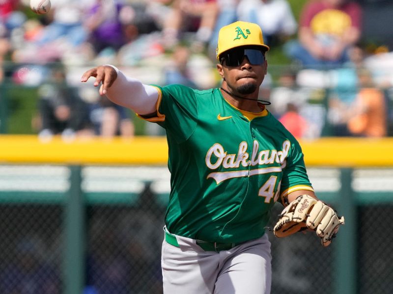 Mar 14, 2024; Mesa, Arizona, USA; Oakland Athletics shortstop Darell Hernaiz (48) makes the play for an out against the Chicago Cubs in the first inning at Sloan Park. Mandatory Credit: Rick Scuteri-USA TODAY Sports