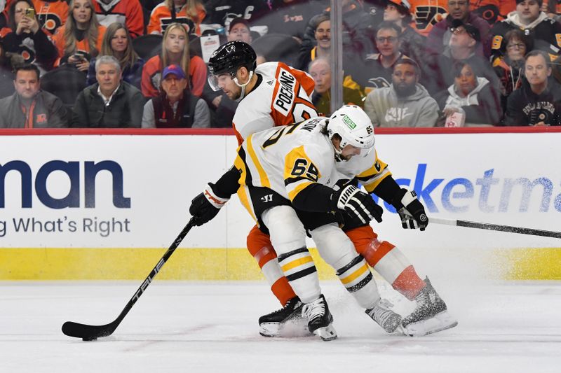 Jan 8, 2024; Philadelphia, Pennsylvania, USA; Philadelphia Flyers center Ryan Poehling (25) is checked by Pittsburgh Penguins defenseman Erik Karlsson (65) during the first period at Wells Fargo Center. Mandatory Credit: Eric Hartline-USA TODAY Sports