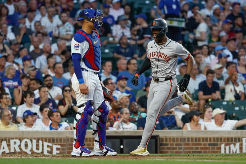 Jun 17, 2024; Chicago, Illinois, USA; San Francisco Giants designated hitter Jorge Soler (2) scores against the Chicago Cubs during the fourth inning at Wrigley Field. Mandatory Credit: Kamil Krzaczynski-USA TODAY Sports