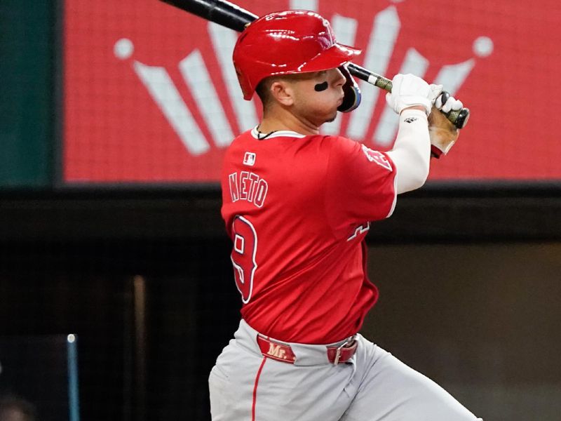 May 18, 2024; Arlington, Texas, USA; Los Angeles Angels shortstop Zach Neto (9) hits a double during the third inning against the Texas Rangers at Globe Life Field. Mandatory Credit: Raymond Carlin III-USA TODAY Sports