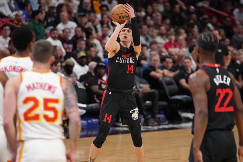 MIAMI, FL - JANUARY 19: Tyler Herro #14 of the Miami Heat shoots the ball during the game against the Atlanta Hawks on January 19, 2024 at Kaseya Center in Miami, Florida. NOTE TO USER: User expressly acknowledges and agrees that, by downloading and or using this Photograph, user is consenting to the terms and conditions of the Getty Images License Agreement. Mandatory Copyright Notice: Copyright 2024 NBAE (Photo by Eric Espada/NBAE via Getty Images)