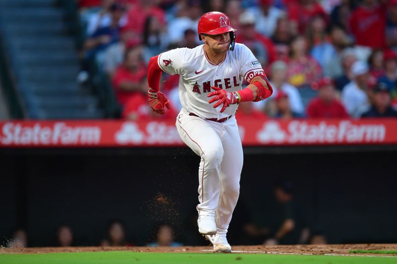 Sep 4, 2023; Anaheim, California, USA; Los Angeles Angels catcher Logan O'Hoppe (14) hits a single against the Baltimore Orioles during the second inning at Angel Stadium. Mandatory Credit: Gary A. Vasquez-USA TODAY Sports