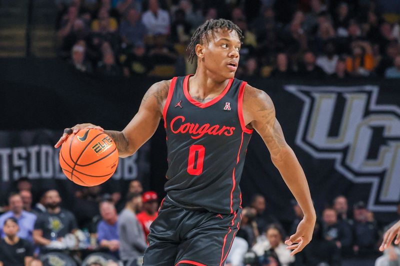 Jan 25, 2023; Orlando, Florida, USA; Houston Cougars guard Marcus Sasser (0) looks to pass during the second half against the UCF Knights at Addition Financial Arena. Mandatory Credit: Mike Watters-USA TODAY Sports