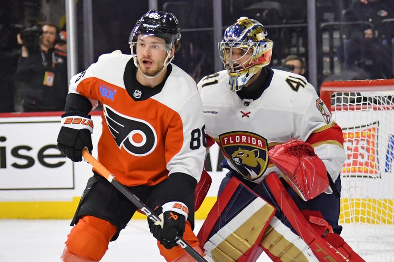 Mar 24, 2024; Philadelphia, Pennsylvania, USA; Philadelphia Flyers left wing Joel Farabee (86) battles for position with Florida Panthers goaltender Anthony Stolarz (41) during the first period at Wells Fargo Center. Mandatory Credit: Eric Hartline-USA TODAY Sports