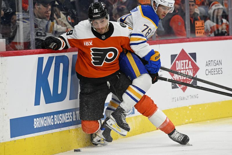 Dec 3, 2025; Philadelphia, Pennsylvania, USA; Philadelphia Flyers right wing Garnet Hathaway (19) and Buffalo Sabres defenseman Jacob Bryson (78) battle for the puck during the second period at Xfinity Mobile Arena. Mandatory Credit: Eric Hartline-Imagn Images