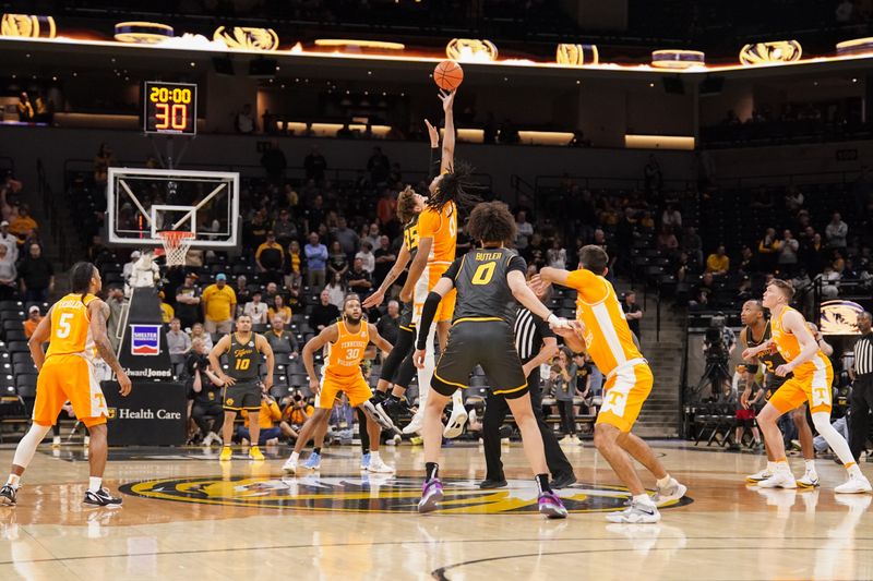 Feb 20, 2024; Columbia, Missouri, USA; Tennessee Volunteers forward Jonas Aidoo (0) and Missouri Tigers forward Noah Carter (35) fight for the opening jump ball during the first half at Mizzou Arena. Mandatory Credit: Denny Medley-USA TODAY Sports