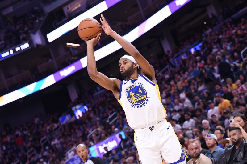 SAN FRANCISCO, CA - OCTOBER 11: Moses Moody #4 of the Golden State Warriors shoots the ball during the game against the Sacramento Kings during a NBA Preseason game on October 11, 2024 at Chase Center in San Francisco, California. NOTE TO USER: User expressly acknowledges and agrees that, by downloading and or using this photograph, user is consenting to the terms and conditions of Getty Images License Agreement. Mandatory Copyright Notice: Copyright 2024 NBAE (Photo by Noah Graham/NBAE via Getty Images)