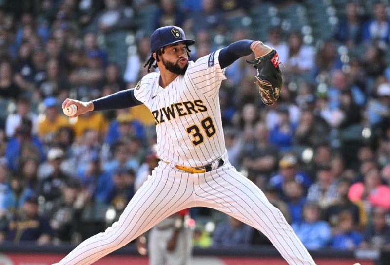 Sep 17, 2023; Milwaukee, Wisconsin, USA; Milwaukee Brewers relief pitcher Devin Williams (38) delivers a pitch against the Washington Nationals to win the ninth inning at American Family Field. Mandatory Credit: Michael McLoone-USA TODAY Sports