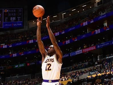 LOS ANGELES, CA - DECEMBER 2:  Taurean Prince #12 of the Los Angeles Lakers shoots a three point basket during the game  on December 2, 2023 at Crypto.Com Arena in Los Angeles, California. NOTE TO USER: User expressly acknowledges and agrees that, by downloading and/or using this Photograph, user is consenting to the terms and conditions of the Getty Images License Agreement. Mandatory Copyright Notice: Copyright 2023 NBAE (Photo by Adam Pantozzi/NBAE via Getty Images)