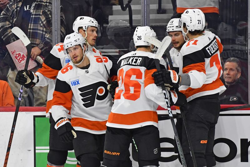 Mar 2, 2024; Philadelphia, Pennsylvania, USA;  Philadelphia Flyers left wing Joel Farabee (86) celebrates his goal with teammates against the Ottawa Senators during the first period at Wells Fargo Center. Mandatory Credit: Eric Hartline-USA TODAY Sports