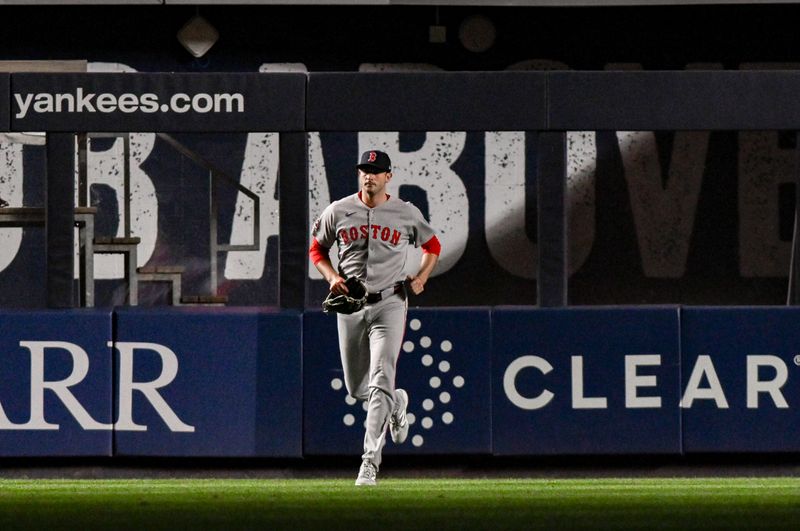 Jun 8, 2025; Bronx, New York, USA; Boston Red Sox pitcher Garrett Whitlock (22) enters the game against the New York Yankees during the seventh inning at Yankee Stadium. Mandatory Credit: John Jones-Imagn Images