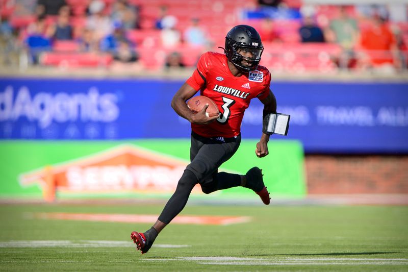 Dec 28, 2021; Dallas, Texas, USA; Louisville Cardinals quarterback Malik Cunningham (3) runs with the ball against the Air Force Falcons during the first half during the 2021 First Responder Bowl at Gerald J. Ford Stadium. Mandatory Credit: Jerome Miron-USA TODAY Sports