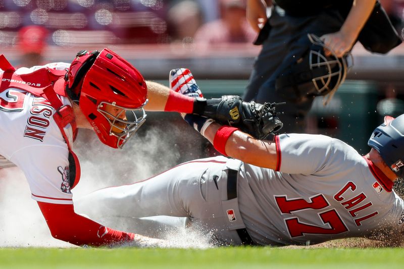 Aug 6, 2023; Cincinnati, Ohio, USA; Cincinnati Reds catcher Tyler Stephenson (37) tags Washington Nationals center fielder Alex Call (17) out at home plate in the fourth inning at Great American Ball Park. Mandatory Credit: Katie Stratman-USA TODAY Sports