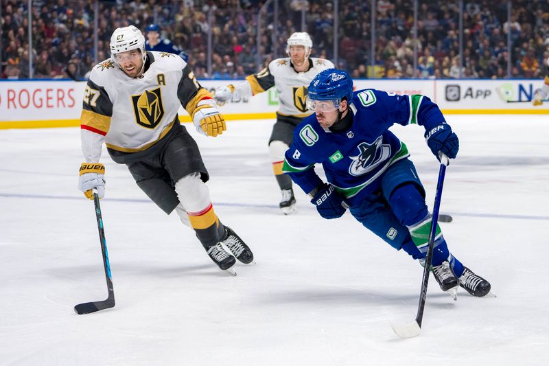 Apr 8, 2024; Vancouver, British Columbia, CAN; Vancouver Canucks forward Conor Garland (8) drives past Vegas Golden Knights defenseman Shea Theodore (27) in the third period at Rogers Arena. Canucks won 4 -3. Mandatory Credit: Bob Frid-USA TODAY Sports