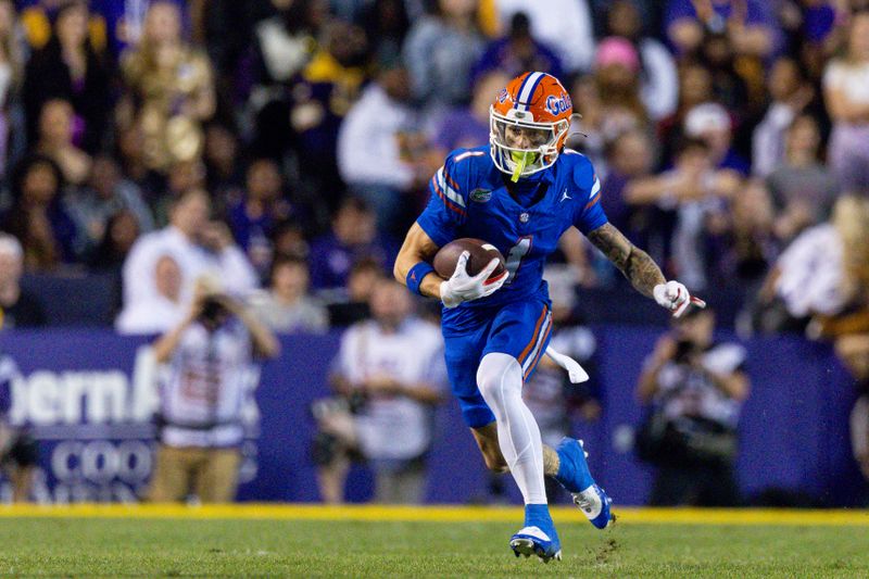 Nov 11, 2023; Baton Rouge, Louisiana, USA;  Florida Gators wide receiver Ricky Pearsall (1) catches a pass against the LSU Tigers during the first half at Tiger Stadium. Mandatory Credit: Stephen Lew-USA TODAY Sports