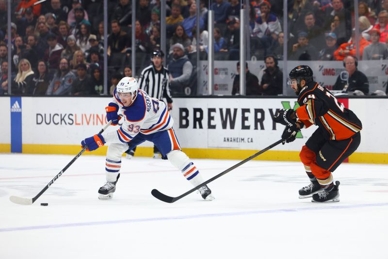 Feb 9, 2024; Anaheim, California, USA; Edmonton Oilers center Ryan Nugent-Hopkins (93) skates with the puck against the Anaheim Ducks during the first period of a game at Honda Center. Mandatory Credit: Jessica Alcheh-USA TODAY Sports