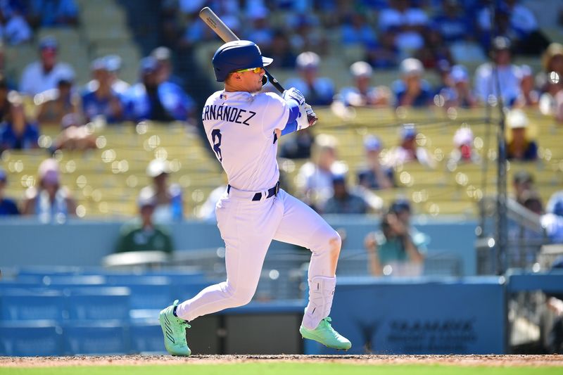 Jul 26, 2023; Los Angeles, California, USA; Los Angeles Dodgers second baseman Enrique Hernandez (8) hits a single against the Toronto Blue Jays during the eighth inning at Dodger Stadium. Mandatory Credit: Gary A. Vasquez-USA TODAY Sports