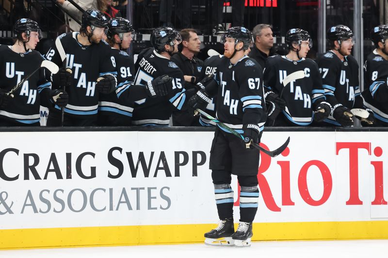 Oct 24, 2024; Salt Lake City, Utah, USA; Utah Hockey Club left wing Lawson Crouse (67) celebrates a goal against the Colorado Avalanche during the third period at Delta Center. Mandatory Credit: Rob Gray-Imagn Images