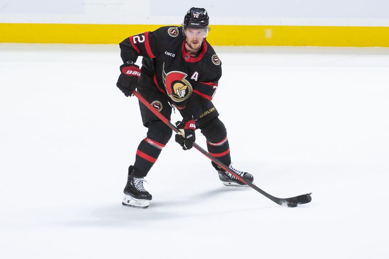 Apr 6, 2024; Ottawa, Ontario, CAN; Ottawa Senators defenseman Thomas Chabot (72) skates with the puck in the third period against the New Jersey Devils at the Canadian Tire Centre. Mandatory Credit: Marc DesRosiers-USA TODAY Sports