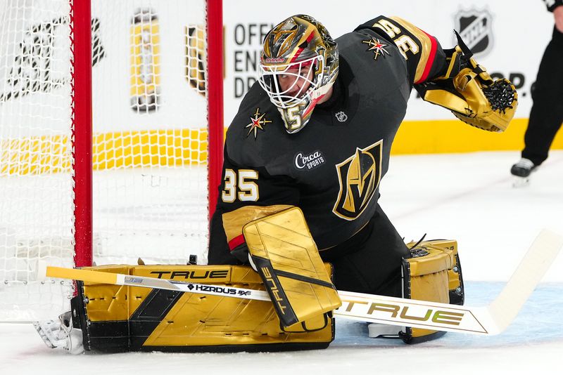 Oct 13, 2024; Las Vegas, Nevada, USA; Vegas Golden Knights goaltender Ilya Samsonov (35) defends his net against the Anaheim Ducks during the first period at T-Mobile Arena. Mandatory Credit: Stephen R. Sylvanie-Imagn Images