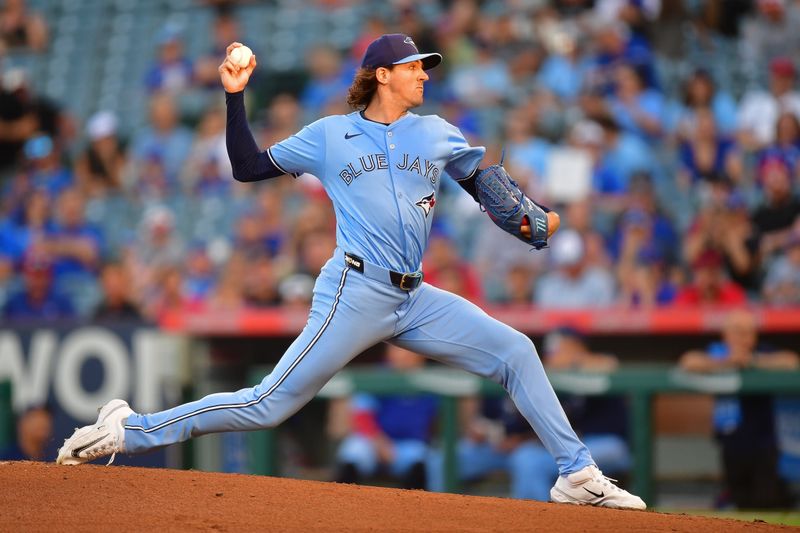 Aug 13, 2024; Anaheim, California, USA; Toronto Blue Jays pitcher Ryan Burr (43) throws against the Los Angeles Angels during the first inning at Angel Stadium. Mandatory Credit: Gary A. Vasquez-USA TODAY Sports