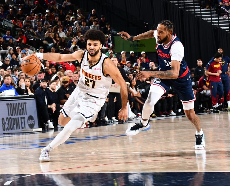 INGLEWOOD, CA - APRIL 26:  Jamal Murray #27 of the Denver Nuggets dribbles the ball during Round One, Game Four of the 2025 NBA Playoffs against the LA Clippers on April 26, 2025 at Intuit Dome in Los Angeles, California. NOTE TO USER: User expressly acknowledges and agrees that, by downloading and/or using this Photograph, user is consenting to the terms and conditions of the Getty Images License Agreement. Mandatory Copyright Notice: Copyright 2025 NBAE (Photo by Juan Ocampo/NBAE via Getty Images)