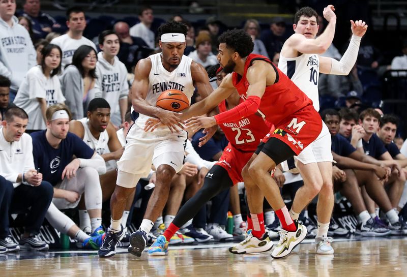 Mar 5, 2023; University Park, Pennsylvania, USA; Maryland Terrapins guard Don Carey (0) attempts to steal the ball from Penn State Nittany Lions guard Jalen Pickett (22) during the second half at Bryce Jordan Center. Mandatory Credit: Matthew OHaren-USA TODAY Sports