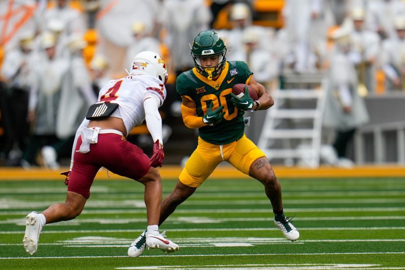 Oct 28, 2023; Waco, Texas, USA;  Baylor Bears wide receiver Monaray Baldwin (80) makes a catch against Iowa State Cyclones defensive back Jeremiah Cooper (4) during the first half at McLane Stadium. Mandatory Credit: Chris Jones-USA TODAY Sports