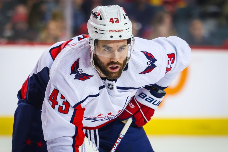 Mar 18, 2024; Calgary, Alberta, CAN; Washington Capitals right wing Tom Wilson (43) during the face off against the Calgary Flames during the first period at Scotiabank Saddledome. Mandatory Credit: Sergei Belski-USA TODAY Sports