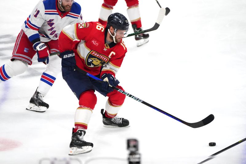 Jun 1, 2024; Sunrise, Florida, USA; Florida Panthers center Aleksander Barkov (16) brings the puck up the ice against the New York Rangers during the second period in game six of the Eastern Conference Final of the 2024 Stanley Cup Playoffs at Amerant Bank Arena. Mandatory Credit: Jim Rassol-USA TODAY Sports