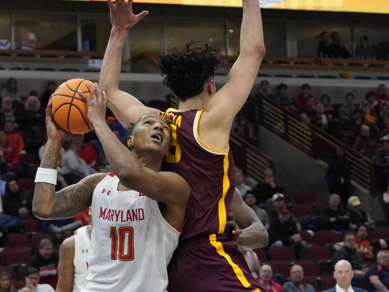 Mar 9, 2023; Chicago, IL, USA; Minnesota Golden Gophers forward Dawson Garcia (3) defends Maryland Terrapins forward Julian Reese (10) during the second half at United Center. Mandatory Credit: David Banks-USA TODAY Sports