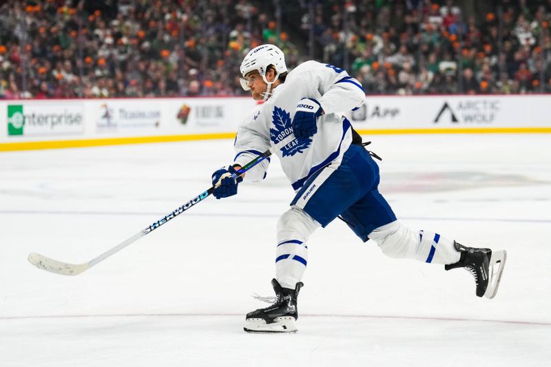 Nov 3, 2024; Saint Paul, Minnesota, USA; Toronto Maple Leafs right wing William Nylander (88) shoots during the first period against the Minnesota Wild at Xcel Energy Center. Mandatory Credit: Brace Hemmelgarn-Imagn Images