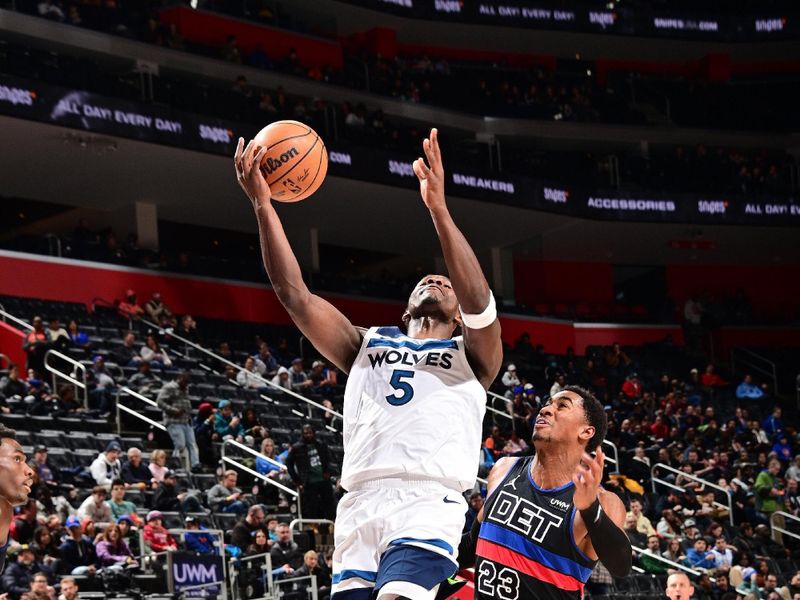 DETROIT, MI - JANUARY 17: Anthony Edwards #5 of the Minnesota Timberwolves drives to the basket during the game against the Detroit Pistons on January 17, 2024 at Little Caesars Arena in Detroit, Michigan. NOTE TO USER: User expressly acknowledges and agrees that, by downloading and/or using this photograph, User is consenting to the terms and conditions of the Getty Images License Agreement. Mandatory Copyright Notice: Copyright 2024 NBAE (Photo by Chris Schwegler/NBAE via Getty Images)