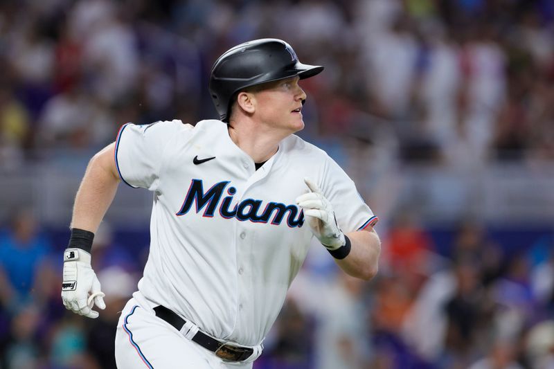 Jul 30, 2023; Miami, Florida, USA; Miami Marlins designated hitter Garrett Cooper (26) circles the bases after hitting a two-run home run against the Detroit Tigers during the seventh inning at loanDepot Park. Mandatory Credit: Sam Navarro-USA TODAY Sports