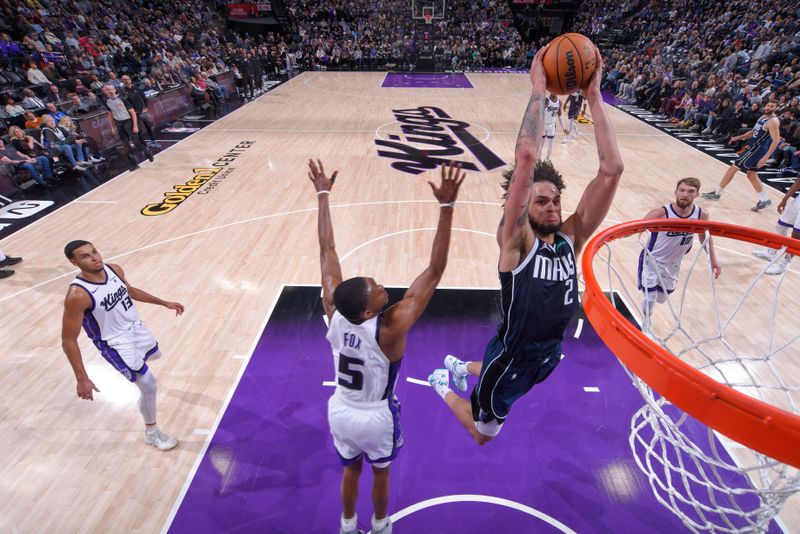 SACRAMENTO, CA - MARCH 29:  Dereck Lively II #2 of the Dallas Mavericks goes to the basket during the game on March 29, 2024 at Golden 1 Center in Sacramento, California. NOTE TO USER: User expressly acknowledges and agrees that, by downloading and or using this Photograph, user is consenting to the terms and conditions of the Getty Images License Agreement. Mandatory Copyright Notice: Copyright 2024 NBAE (Photo by Rocky Widner/NBAE via Getty Images)