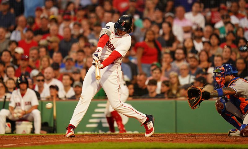 Jul 23, 2023; Boston, Massachusetts, USA; Boston Red Sox first baseman Triston Casas (36) hits a single to drive in a run against the New York Mets in the third inning at Fenway Park. Mandatory Credit: David Butler II-USA TODAY Sports