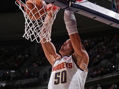 DENVER, CO - DECEMBER 25: Aaron Gordon #50 of the Denver Nuggets dunks the ball during the game against the Golden State Warriors on December 25, 2023 at the Ball Arena in Denver, Colorado. NOTE TO USER: User expressly acknowledges and agrees that, by downloading and/or using this Photograph, user is consenting to the terms and conditions of the Getty Images License Agreement. Mandatory Copyright Notice: Copyright 2023 NBAE (Photo by Bart Young/NBAE via Getty Images)