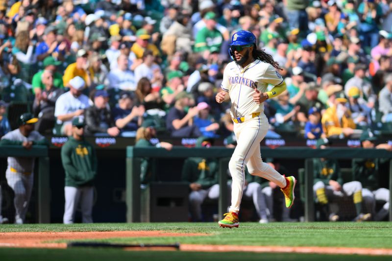 Sep 29, 2024; Seattle, Washington, USA; Seattle Mariners shortstop J.P. Crawford (3) scores a run against the Oakland Athletics during the fifth inning at T-Mobile Park. Mandatory Credit: Steven Bisig-Imagn Images