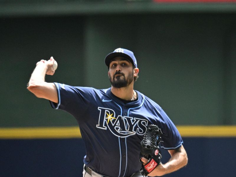 May 1, 2024; Milwaukee, Wisconsin, USA; Tampa Bay Rays starting pitcher Zach Eflin (24) delivers a pitch against the Milwaukee Brewers in the first inning at American Family Field. Mandatory Credit: Michael McLoone-USA TODAY Sports