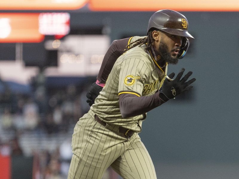 Sep 13, 2024; San Francisco, California, USA;  San Diego Padres outfielder Fernando Tatis Jr. (23) runs towards home plate after hitting a two run homerun during the first inning against the San Francisco Giants at Oracle Park. Mandatory Credit: Stan Szeto-Imagn Images