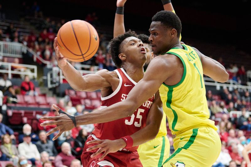 Jan 21, 2023; Stanford, California, USA; Stanford Cardinal forward Harrison Ingram (55) passes against Oregon Ducks center N'Faly Dante (1) during the first half at Maples Pavilion. Mandatory Credit: Robert Edwards-USA TODAY Sports