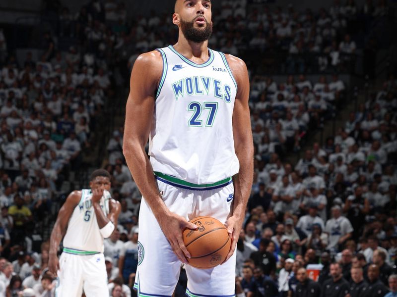 MINNEAPOLIS, MN -  MAY 22:  Rudy Gobert #27 of the Minnesota Timberwolves shoots a free throw during the game  against the Dallas Mavericks during Game 1 of the Western Conference Finals of the 2024 NBA Playoffs on May 22, 2024 at Target Center in Minneapolis, Minnesota. NOTE TO USER: User expressly acknowledges and agrees that, by downloading and or using this Photograph, user is consenting to the terms and conditions of the Getty Images License Agreement. Mandatory Copyright Notice: Copyright 2024 NBAE (Photo by David Sherman/NBAE via Getty Images)