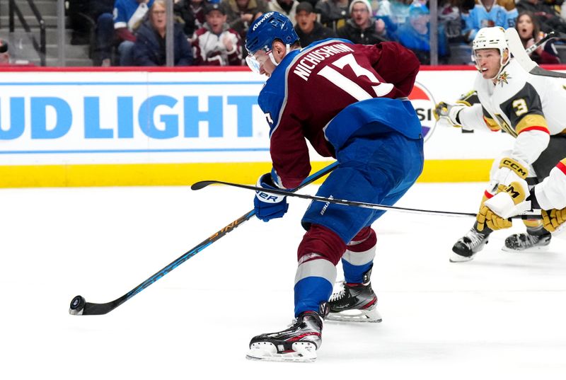 Jan 10, 2024; Denver, Colorado, USA; Colorado Avalanche right wing Valeri Nichushkin (13) shoots the puck in the second period against the Vegas Golden Knights at Ball Arena. Mandatory Credit: Ron Chenoy-USA TODAY Sports