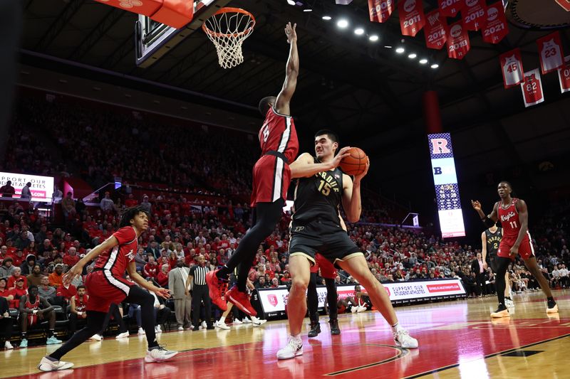 Jan 28, 2024; Piscataway, New Jersey, USA; Purdue Boilermakers center Zach Edey (15) drives for a shot as Rutgers Scarlet Knights forward Aundre Hyatt (5) defends  during the first half at Jersey Mike's Arena. Mandatory Credit: Vincent Carchietta-USA TODAY Sports