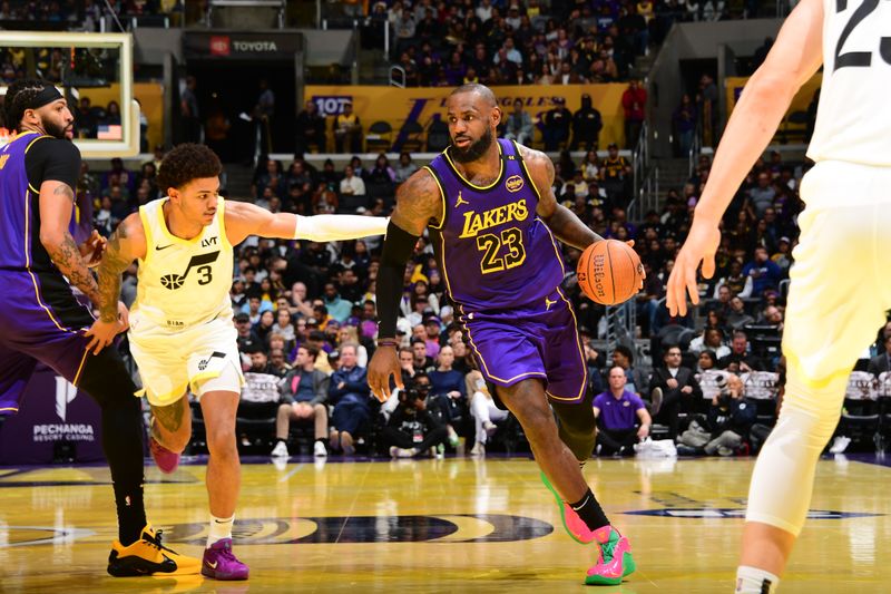 LOS ANGELES, CA - NOVEMBER 19: LeBron James #23 of the Los Angeles Lakers handles the ball during the game against the Utah Jazz during the Emirates NBA Cup game on November 19, 2024 at Crypto.Com Arena in Los Angeles, California. NOTE TO USER: User expressly acknowledges and agrees that, by downloading and/or using this Photograph, user is consenting to the terms and conditions of the Getty Images License Agreement. Mandatory Copyright Notice: Copyright 2024 NBAE (Photo by Adam Pantozzi/NBAE via Getty Images)