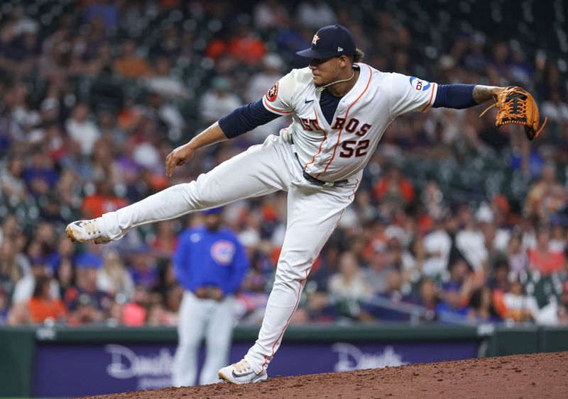 May 17, 2023; Houston, Texas, USA; Houston Astros relief pitcher Bryan Abreu (52) delivers a pitch during the ninth inning against the Chicago Cubs at Minute Maid Park. Mandatory Credit: Troy Taormina-USA TODAY Sports