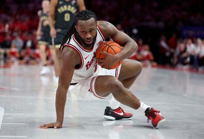 Mar 1, 2026; Columbus, Ohio, USA;  Ohio State Buckeyes guard Bruce Thornton (2) controls the loose ball during the first half against the Purdue Boilermakers at Value City Arena. Mandatory Credit: Joseph Maiorana-Imagn Images