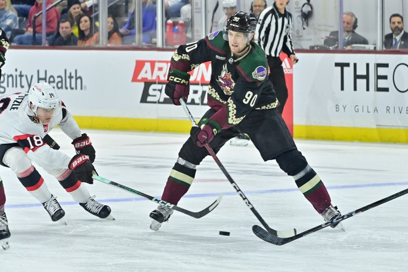 Dec 19, 2023; Tempe, Arizona, USA; Arizona Coyotes defenseman J.J. Moser (90) looks to pass aOttawa Senators center Tim Stutzle (18) defends in the second period at Mullett Arena. Mandatory Credit: Matt Kartozian-USA TODAY Sports