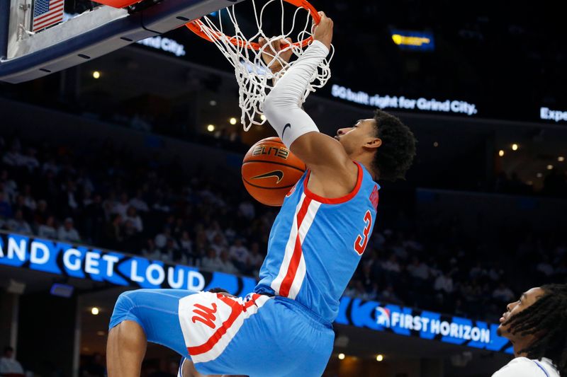 Dec 3, 2022; Memphis, Tennessee, USA; Mississippi Rebels forward Myles Burns (3) dunks during the second half against the Memphis Tigers at FedExForum. Mandatory Credit: Petre Thomas-USA TODAY Sports