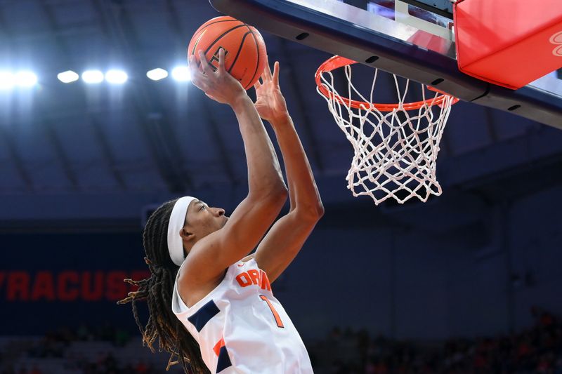 Jan 14, 2023; Syracuse, New York, USA; Syracuse Orange forward Maliq Brown (1) drives to the basket for a shot against the Notre Dame Fighting Irish during the first half at the JMA Wireless Dome. Mandatory Credit: Rich Barnes-USA TODAY Sports